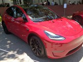 Red Tesla Model Y vehicle