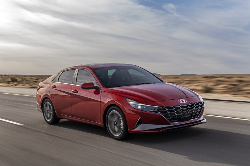 Hyundai Elantra 2021 - red on the road, front  