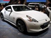 White Nissan 370Z coupe at a car show