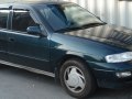 1993 Kia Sephia Hatchback (FA) - Технически характеристики, Разход на гориво, Размери