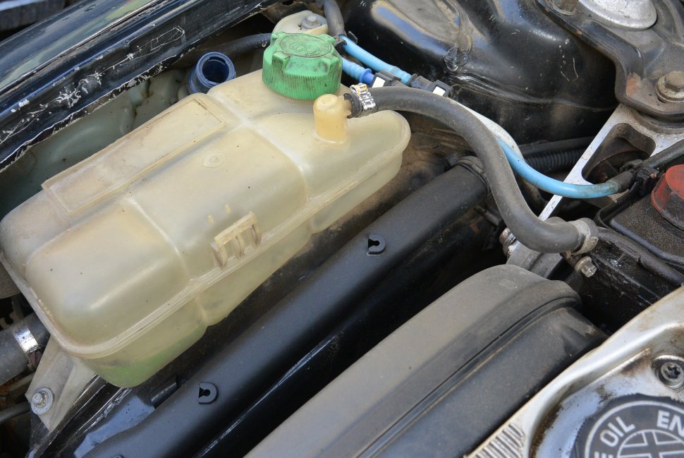 Close up of an empty car fluid tank
